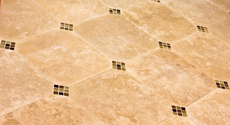 Travertine floor tiles with glass insertions