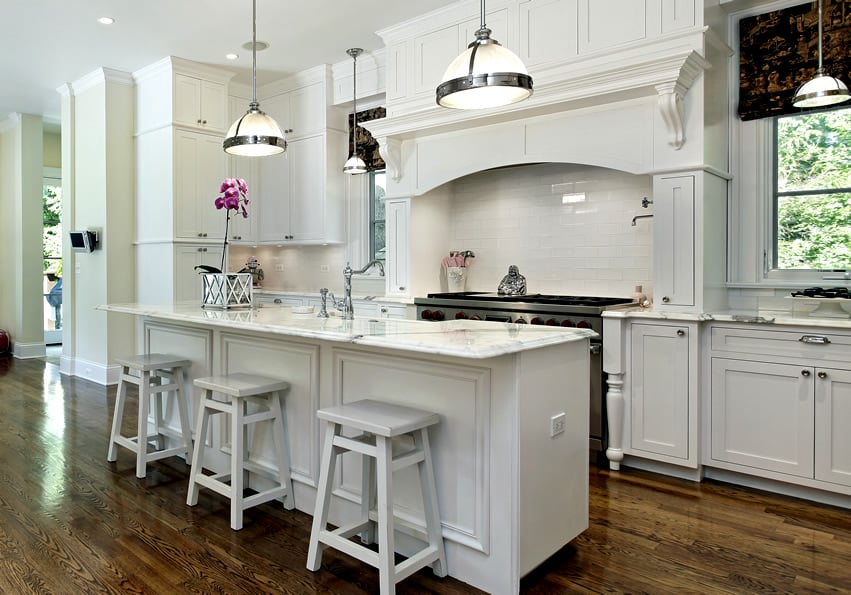 White kitchen with white marble counters