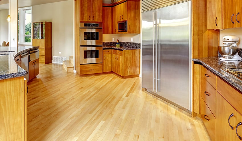 Wood flooring in kitchen with light color