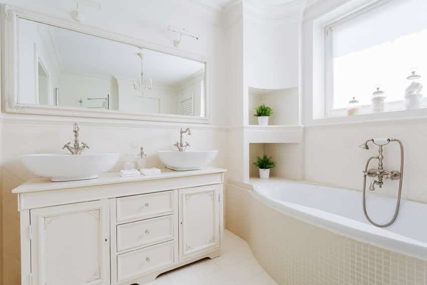 All white bathroom with large window