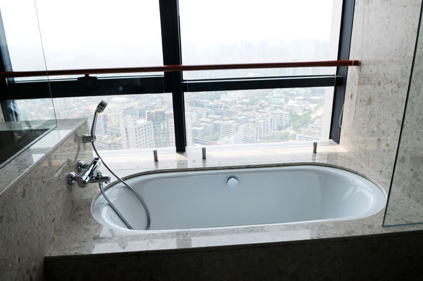 Bathtub with amazing city view from penthouse
