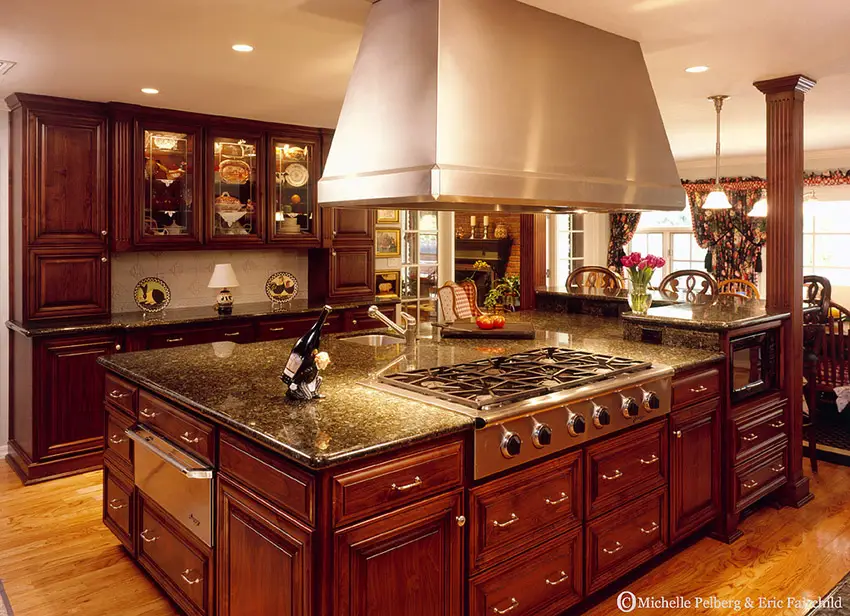 Kitchen with wood elements and massive island