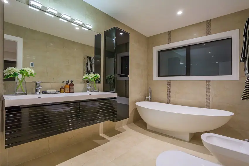 Contemporary bathroom with long curved tub