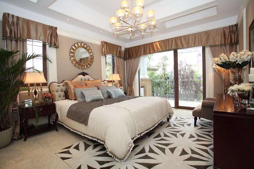 Tufted headboard, oatmeal colored walls and curtains and white floors