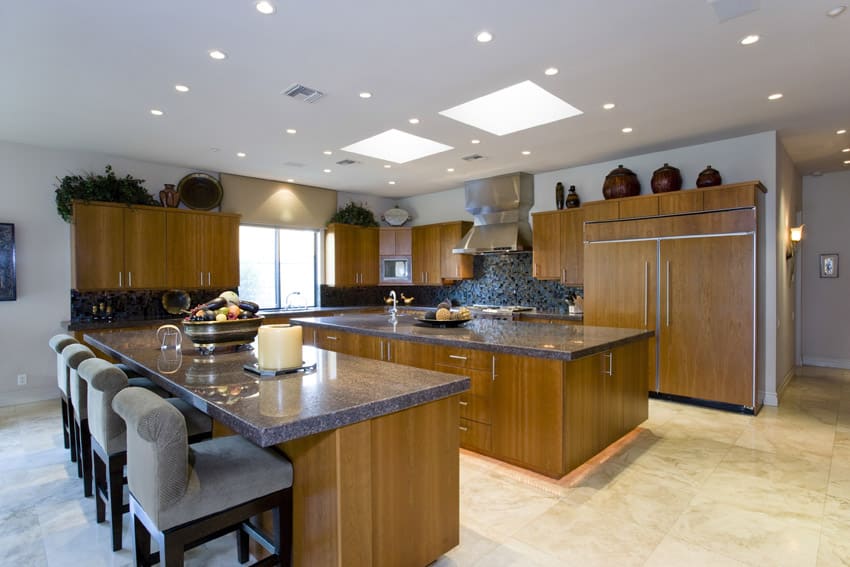 Kitchen with thick slab granite counter eat in dining