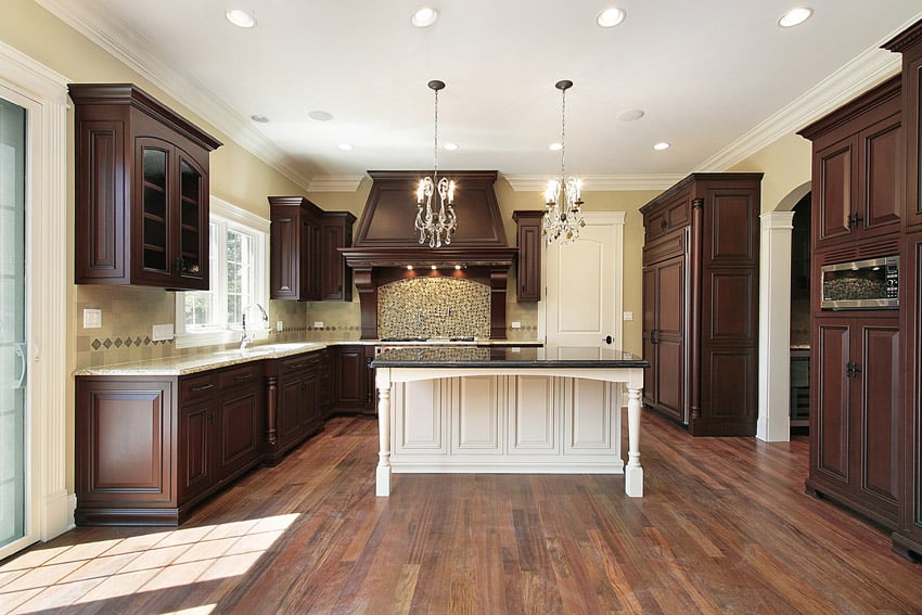 Large kitchen with two tone wood color