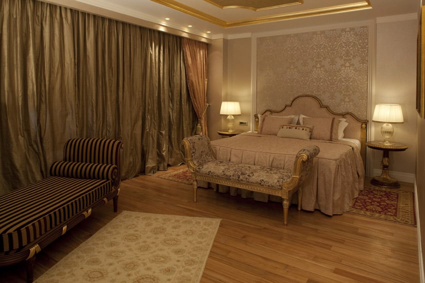 Luxury bedroom design with lounge seat