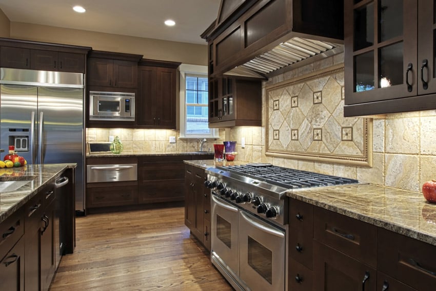 Luxury kitchen with custom tile backsplash
