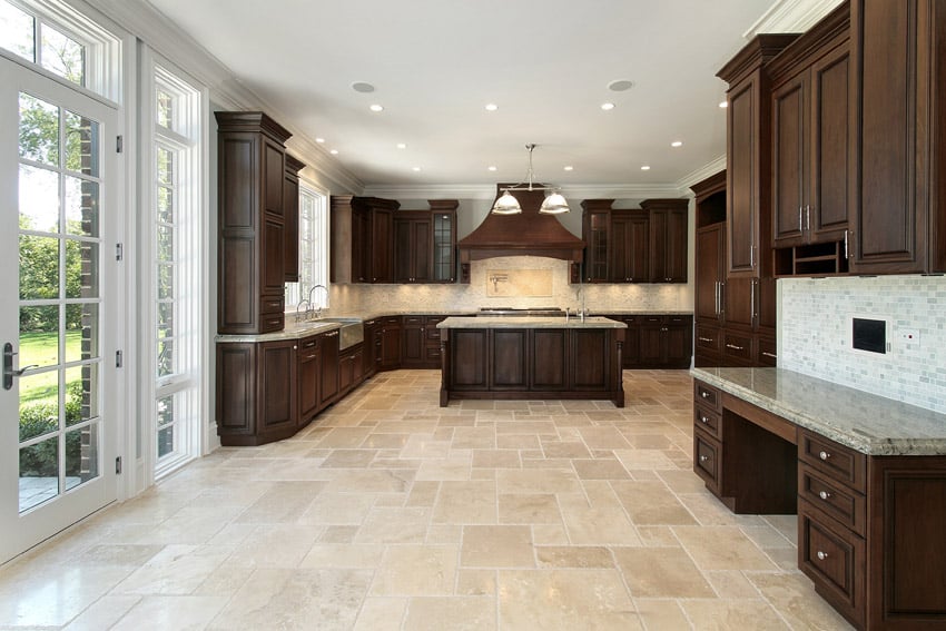 Cabinets with walnut finish with light colored surfaces