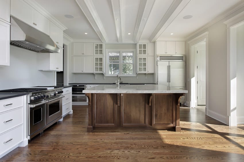 Upscale white-colored kitchen with traditional style