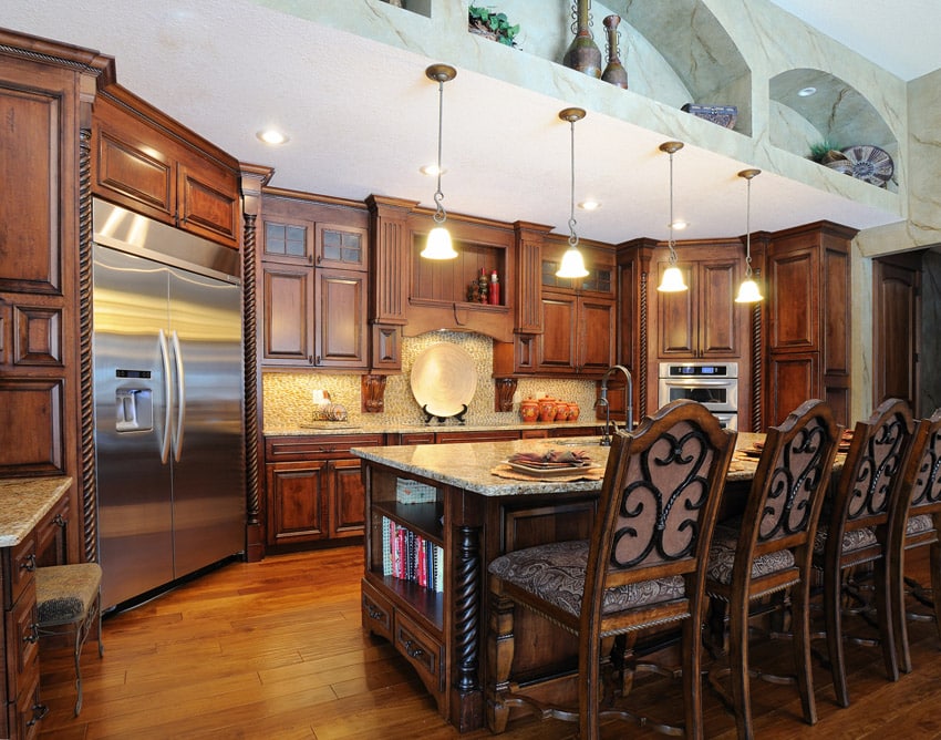 Upscale wood kitchen with pendant lights