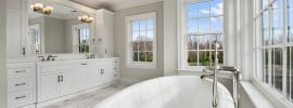 white-marble-bathroom-with-great-lighting-and-windows