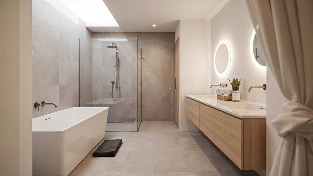 Stylish bathroom with round mirrors over double vanity