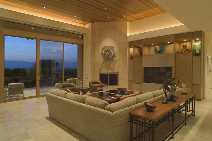 Elegant living room with tray ceiling and views