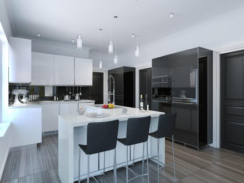 Modern black and white kitchen with wood look tile floor