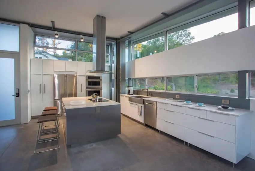 Kitchen with high ceilings with industrial design elements