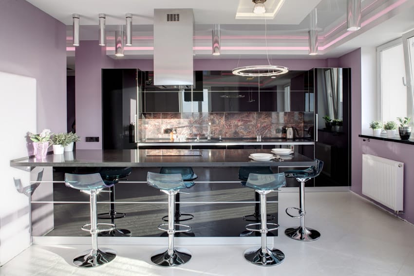 High gloss kitchen with purple finish and stainless steel accents