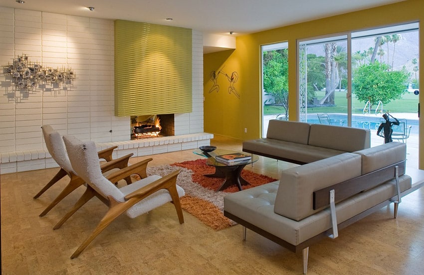 Mid century modern inspired furniture pieces and mustard accent wall