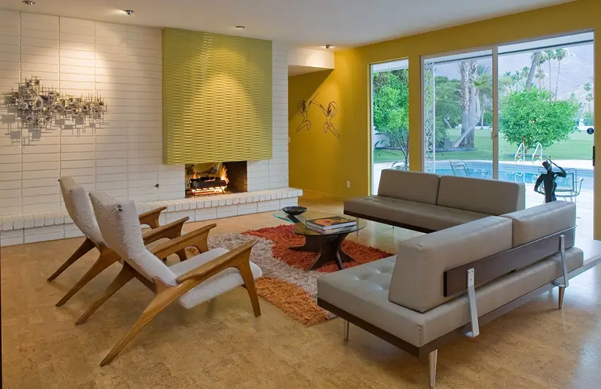 Mid century modern inspired furniture pieces and mustard accent wall