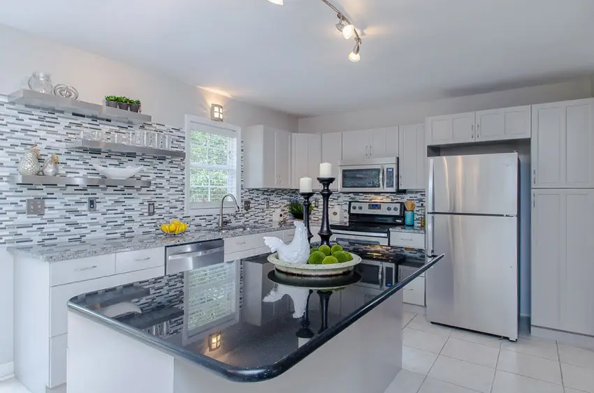 Kitchen with two different kinds of granite countertop materials