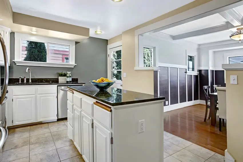 Kitchen with black pearl granite counters and porcelain floors