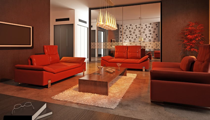 Modern living space with red furniture