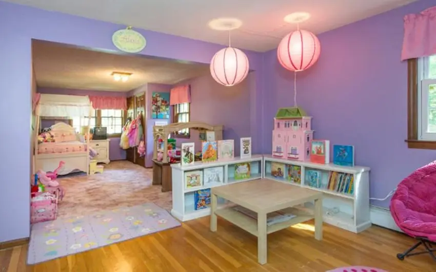 Purple themed bedroom design with globe lighting