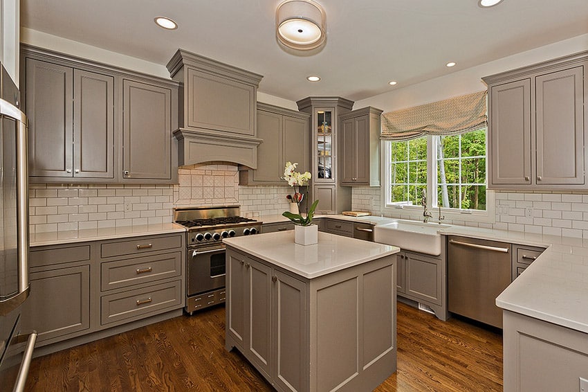 Kitchen with gray cabinets and pearwood floors