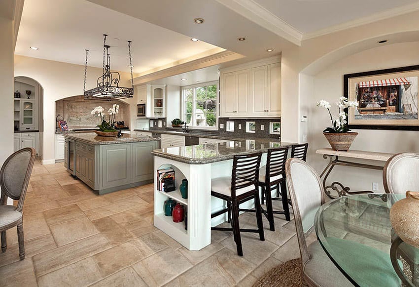 Kitchen with partial hybrid layout with view of dining set