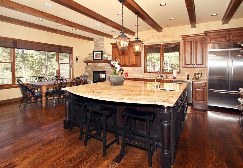 Traditional open plan layout kitchen rustic wood exposed beams