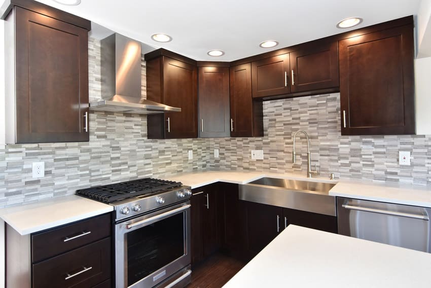 Contemporary kitchen with corian solid surface countertop