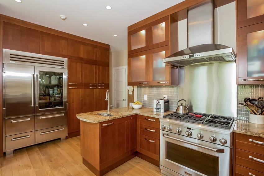 Contemporary kitchen with golden ridge granite counter