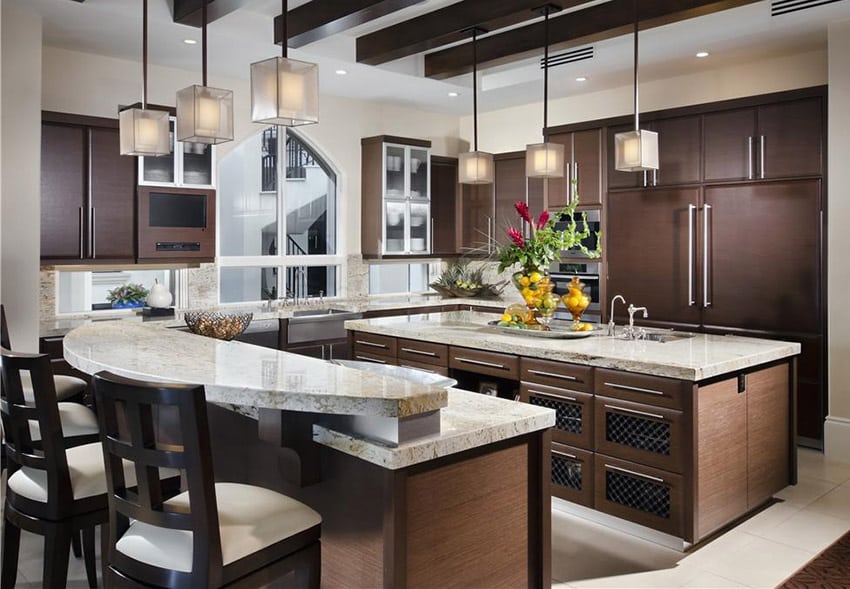 Kitchen with bianco romano granite countertop and brown cabinets