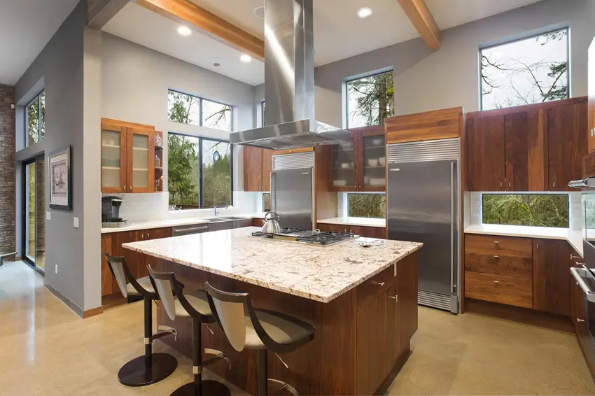 Kitchen with light color granite counters and u shaped design