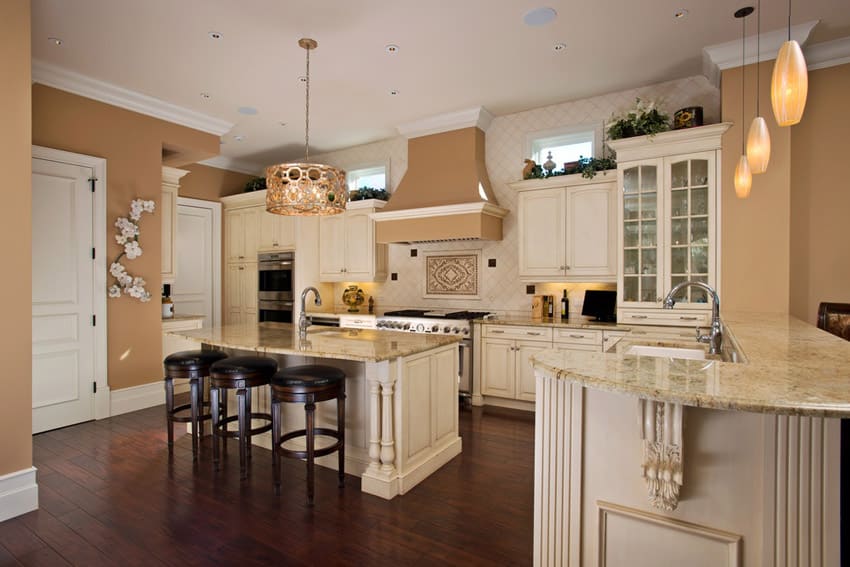 Kitchen with carrara marble counters light blue color island