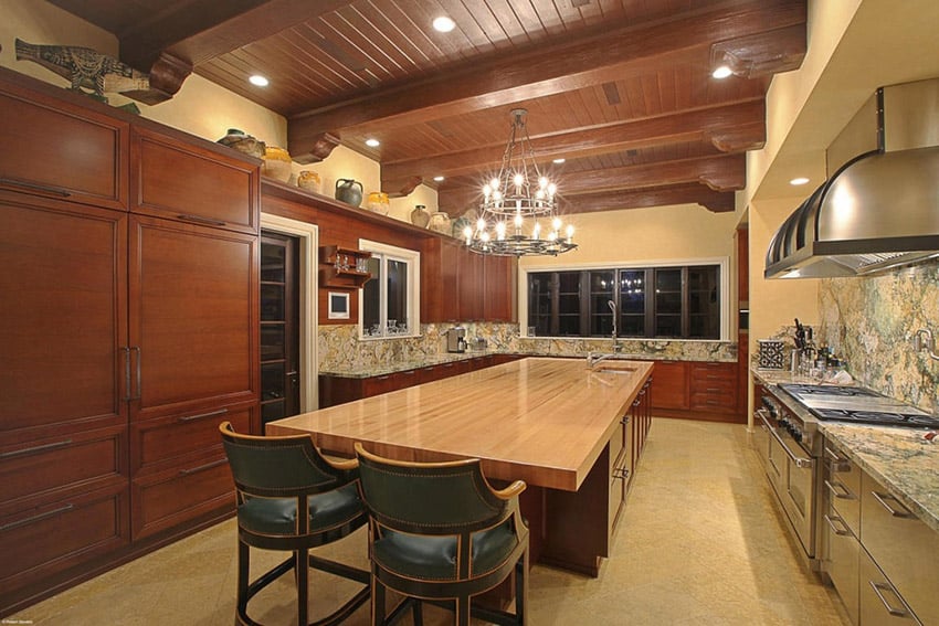 Kitchen with wood ceiling and butcher block island