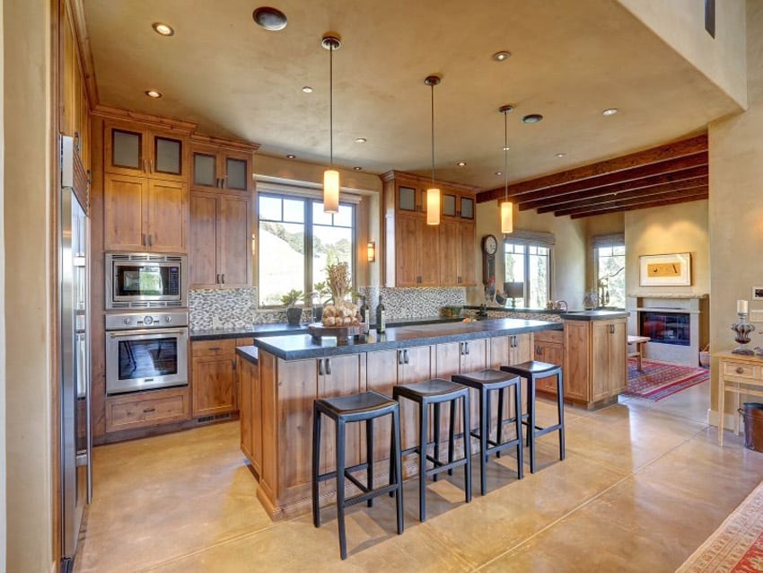 Luxury kitchen with pearl granite counters and eat-in dining island