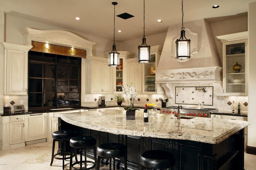 Open plan kitchen with snowfall granite counters