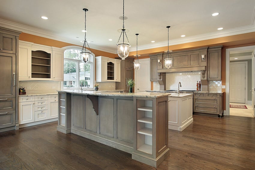 Kitchen in traditional style with white and brown cabinetry