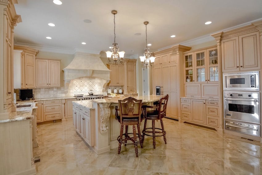 Kitchen with ceiling in white finish, mahogany barstools and light cream walls