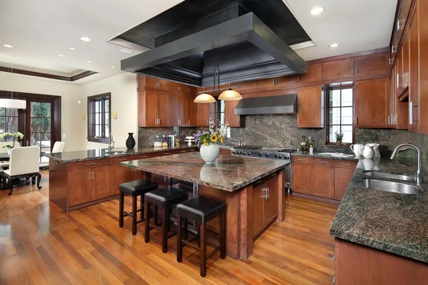 Kitchen with indian dakota granite for main countertops and wooden flooring