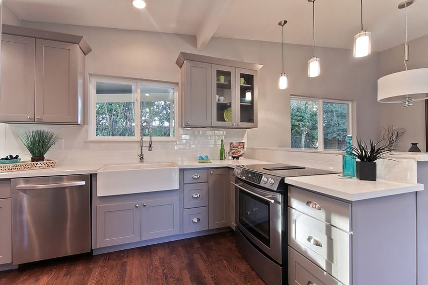 Compact european style kitchen with farmhouse sink