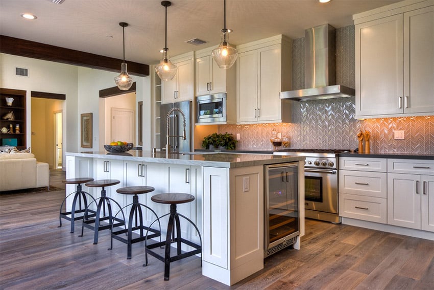 Kitchen with stainless steel metal tile backsplash