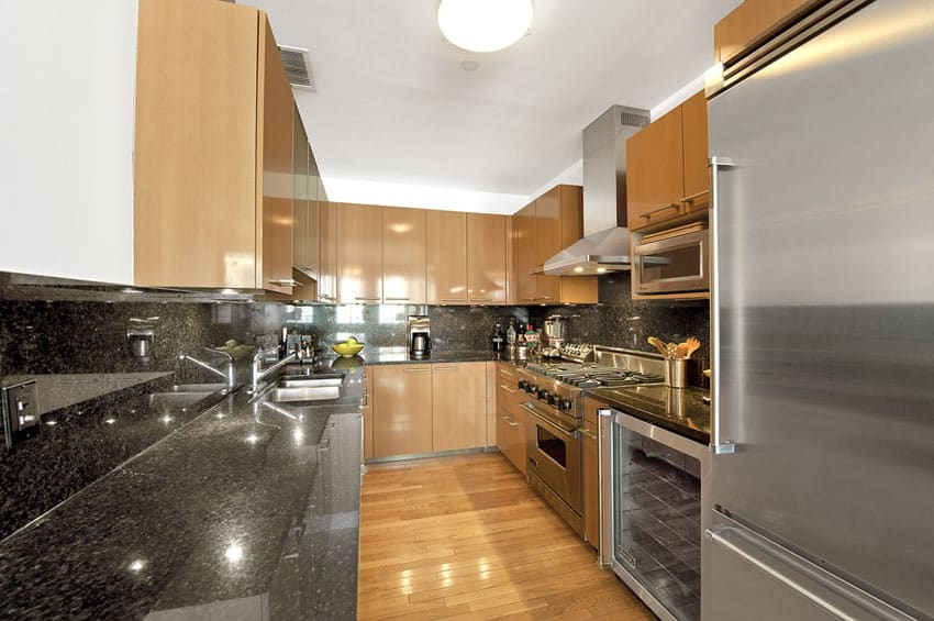 Contemporary galley kitchen with European cabinets