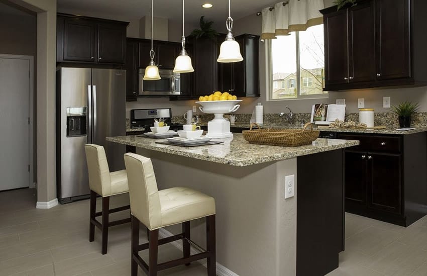 Contemporary kitchen with peppercorn white quartz counter