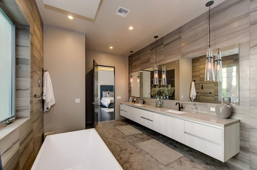 bathroom with retro cone pendants and floating vanity