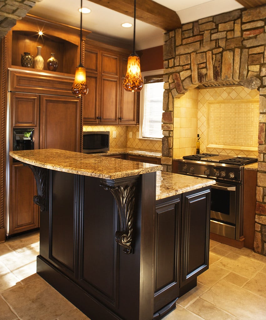 Dark wood compact kitchen with decorative wood island and stone work above range
