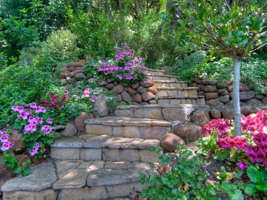 Fieldstone steps through flower garden and bushes