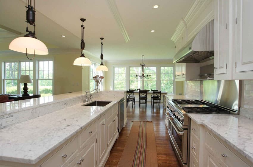 Open kitchen with bianco venatino marble counter