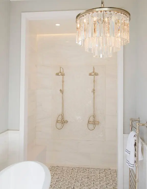 Long glass chandelier in bathroom